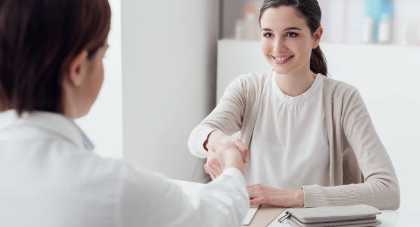 istock Doctor and patient shaking hands 909906090