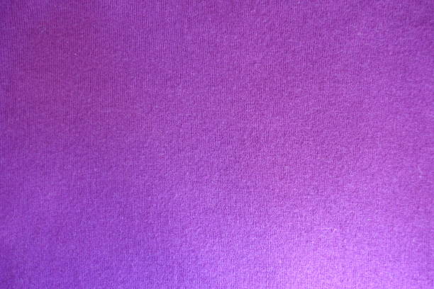 istock Bright pinkish violet knitted fabric from above 909909076