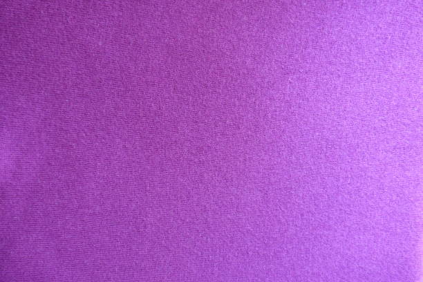 istock Top view of deep pink knitted fabric 909909114