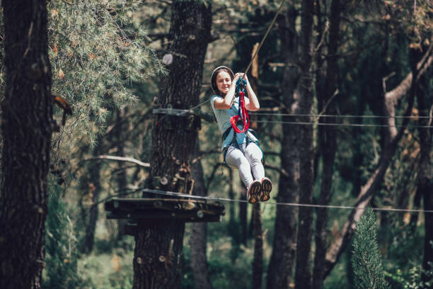 istock Girl in adventure park 909914284