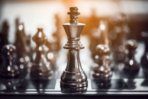 istock chess board game for ideas and competition and strategy 909914720