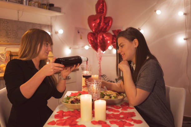 istock Lesbian couple celebrating Valentine's day 909918374