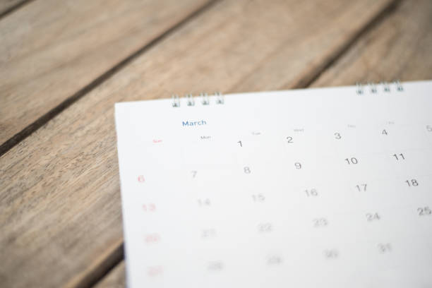 istock White calendar with pencil in planning concept. 909918748