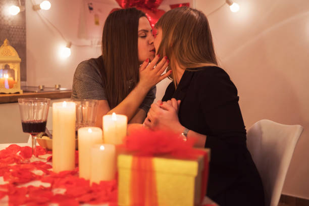 istock Lesbian couple celebrating Valentine's day 909919194