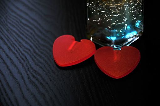 Valentines Day Background Two Red Hearts On Wooden Table