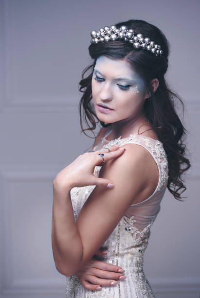 istock Ice queen or snow queen at studio shot 909923042