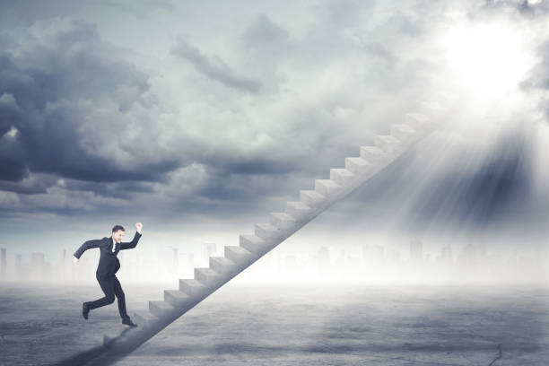 istock American businessman running on the staircase 909923270
