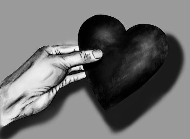 hand holding a heart vector art illustration