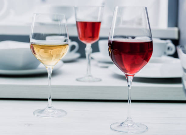 istock White and red wine in a glass 909926432
