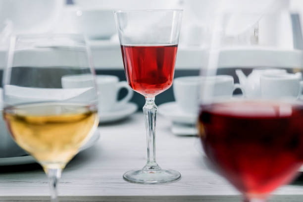 istock White and red wine in a glass 909926630