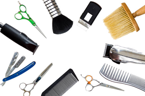 istock Combs, clipper and other hairdresser tools isolated on white background. 909927356