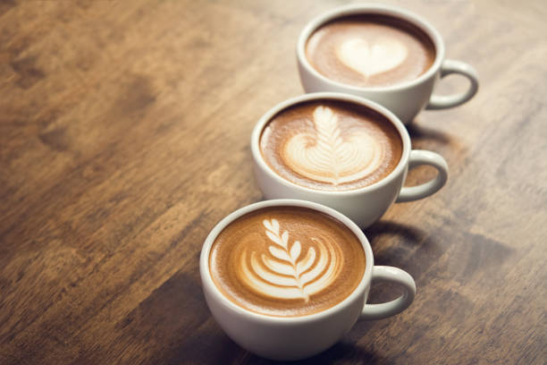 istock Beautiful latte art coffees on the table 909927784