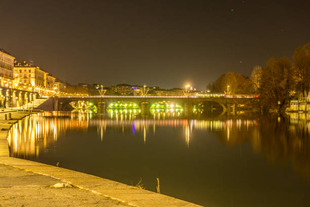 istock Bridge, panorama of turin at night 909945378