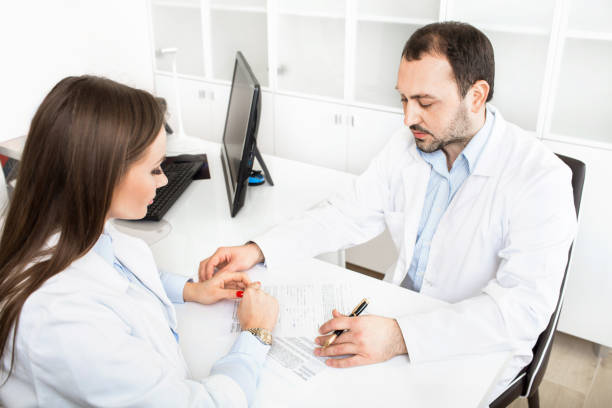istock Two doctors at medical office 909946234