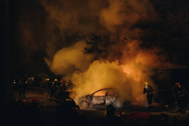 istock Smoke Emitting From Car At Night 909947400