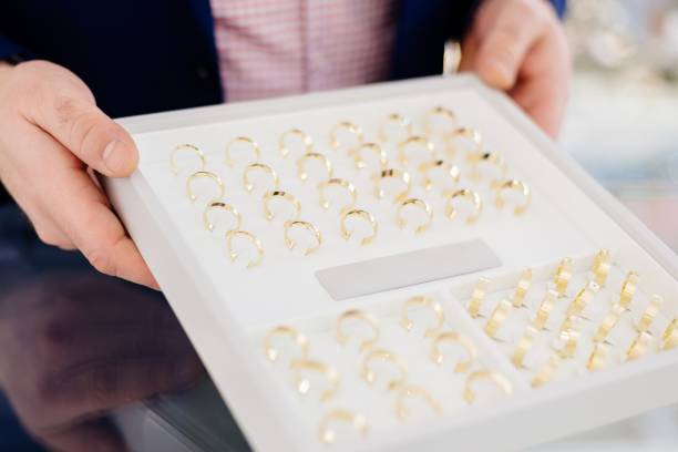 istock Gold and silver wedding rings 909947402