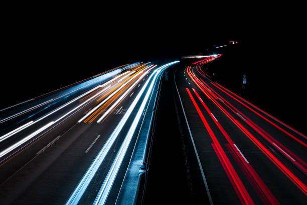 istock Traffic on highway - long exposure, motion blur 909964514