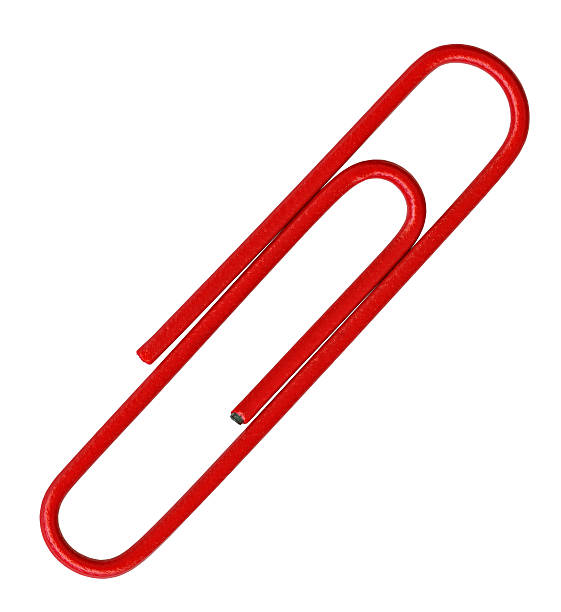 multi-colored paper clips stapled together on a yellow background