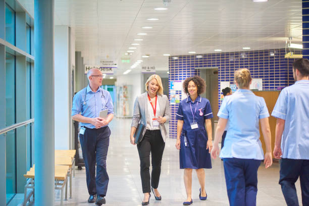 istock business visitor with medical staff 909971982