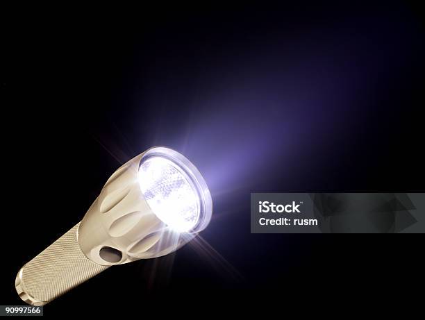 Electric Torch And Beam In The Dark Isolated On Black Stock Photo - Download Image Now