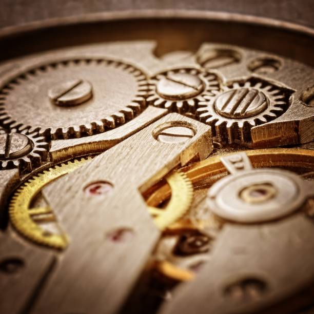 istock clockworks, rusty mechanism in the old clock 909991706