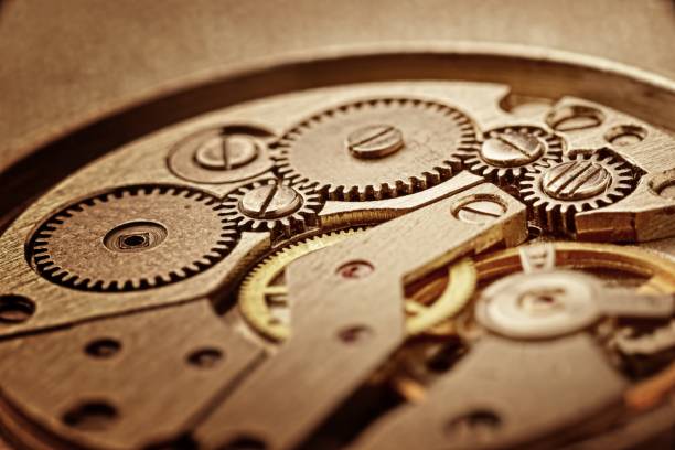 istock clockworks, rusty mechanism in the old clock 909991710
