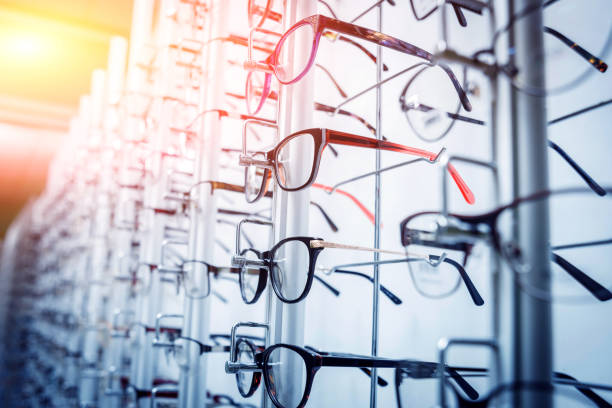 istock Glasses on the shelf. Ophthalmology room. 909994478