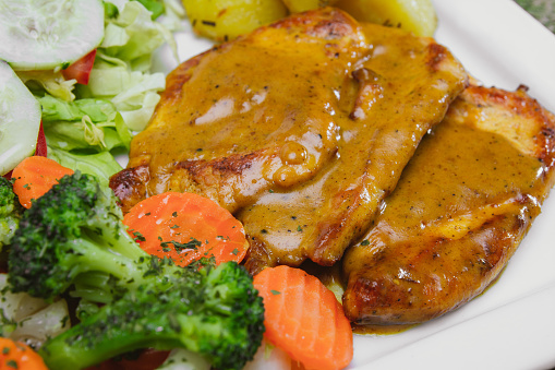 Delicious Chicken in Curry Sauce with Salad
