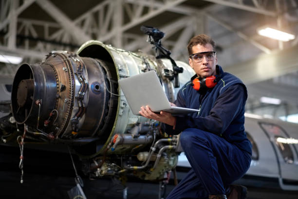 istock Aircraft mechanic in the hangar 909999012