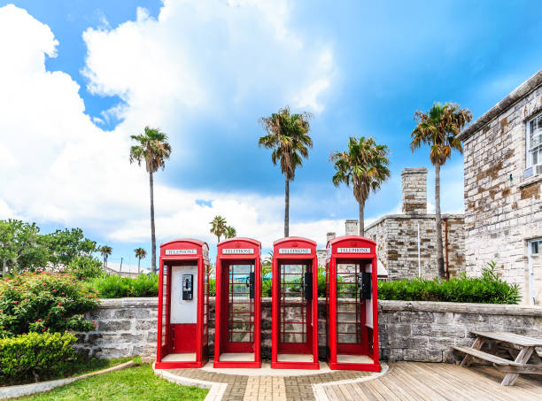 Four British Phone Booths on Bermuda Old classic British red phone booths in Bermuda bermuda stock pictures, royalty-free photos & images
