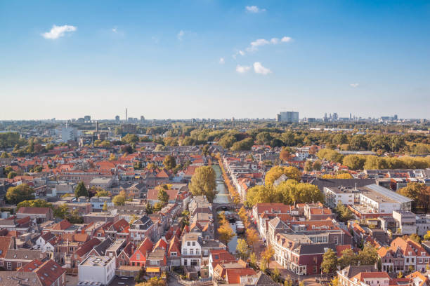 istock Delft, Netherlands - September 23 2017: Traditional netherlands architecture with canals from above 910010138