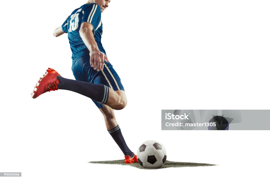 one caucasian soccer player man isolated on white background The one caucasian soccer player man with ball isolated on white background Soccer Stock Photo