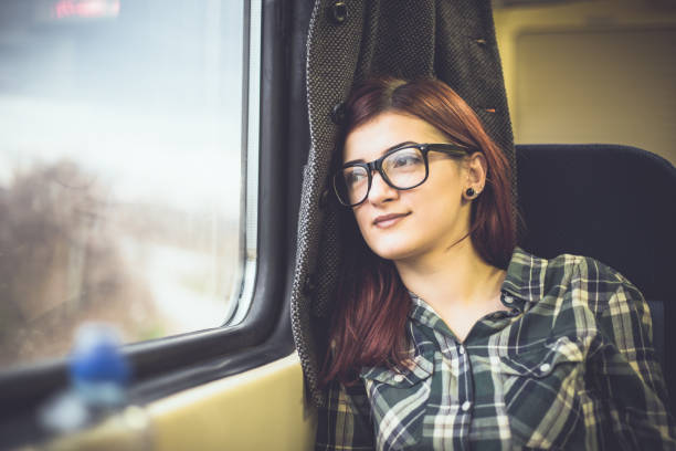 istock Girl in the train 910010338