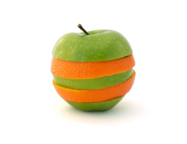 comparação de maçãs para as laranjas - apple orange comparison individuality imagens e fotografias de stock