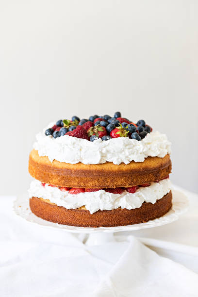 istock Beautiful, fruit naked cake over a white wall 910023068