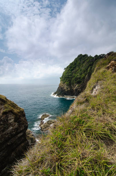 istock Scenic View Of Sea And Cliff 910023536