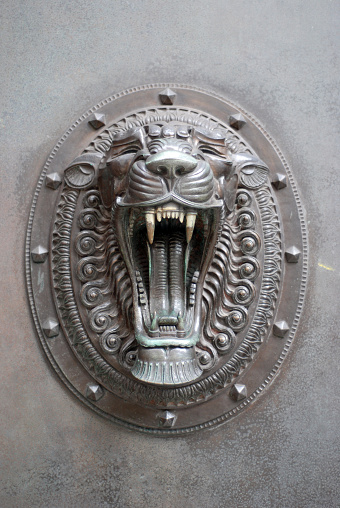Door ornament with lion