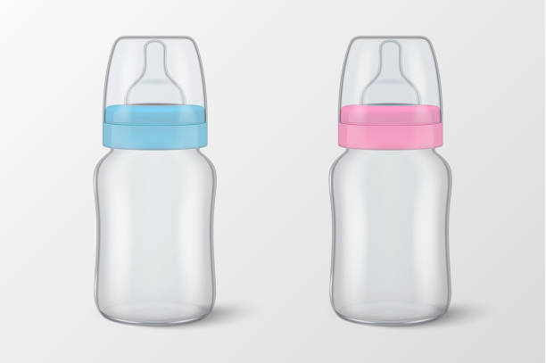 istock Two vector realistic empty blank baby bottles with cap for boy - blue - and girl - pink - icon set closeup isolated. Sterile empty milk container design template, mockup for graphics 910030972