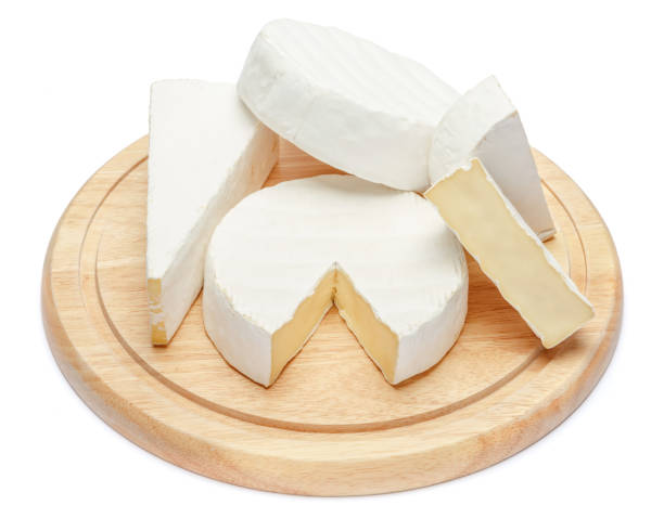 istock pile of brie or camambert cheese on white background 910033580