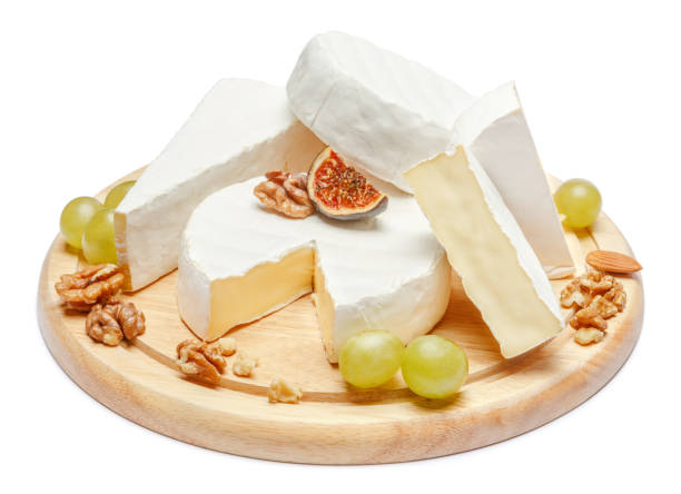 istock pile of brie or camambert cheese on white background 910036650