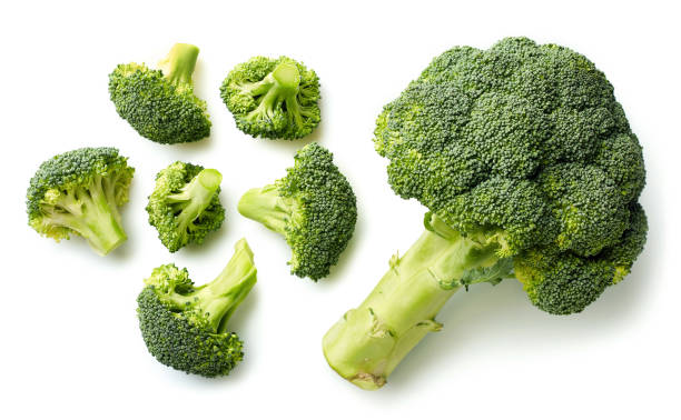Fresh broccoli on white background Fresh broccoli isolated on white background. Top view broccoli stock pictures, royalty-free photos & images