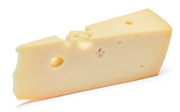 istock swiss cheese or cheddar on white background 910043028