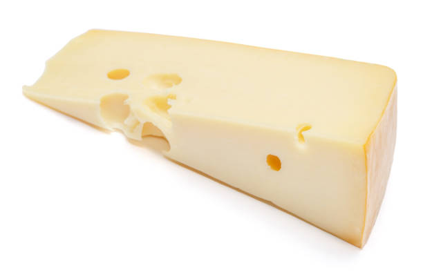 istock swiss cheese or cheddar on white background 910043498