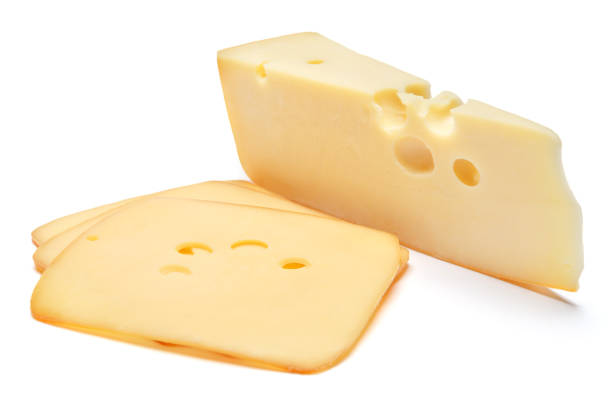 istock swiss cheese or cheddar on white background 910043818