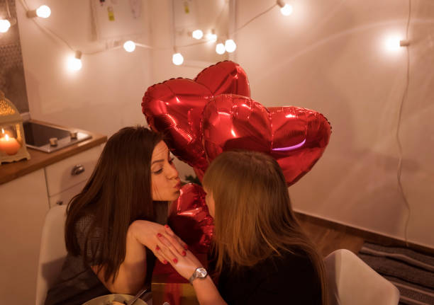 istock Lesbian couple celebrating Valentine's day 910049998