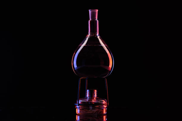 istock glass flask with chemical substance on heater on black 910052944