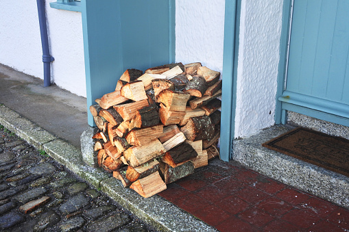 Pile of cut logs for use as winter fuel