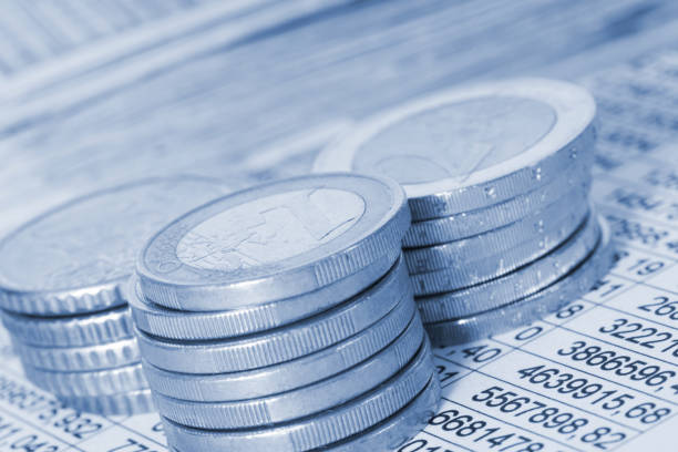 istock A spreadsheet and euro money coins 910060686