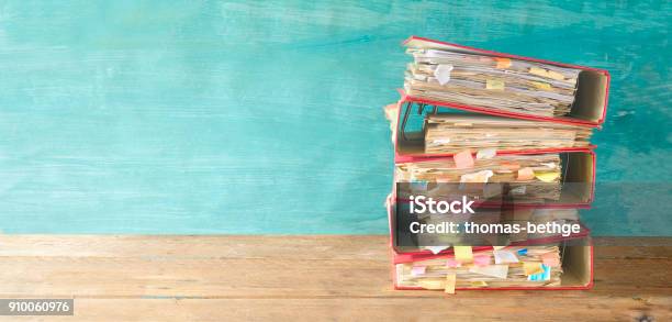 Stack Of Messy File Folders And Documentsred Tape Conceptfree Copy Space Stock Photo - Download Image Now