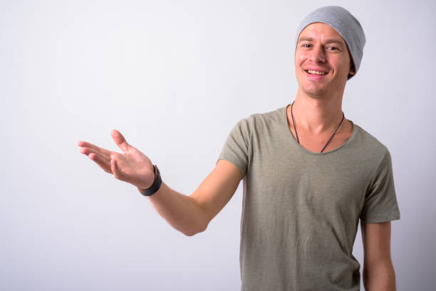 istock Portrait Of Young Man Against White Background 910062500